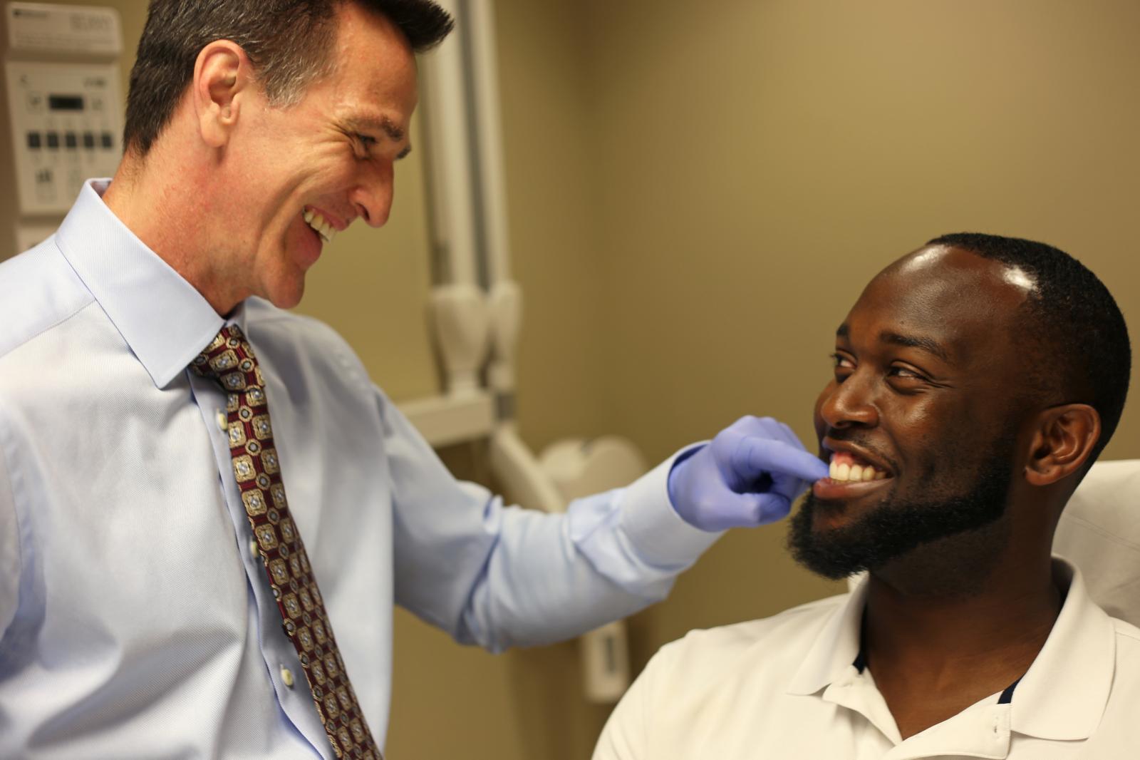 Man getting an orthodontic consultation